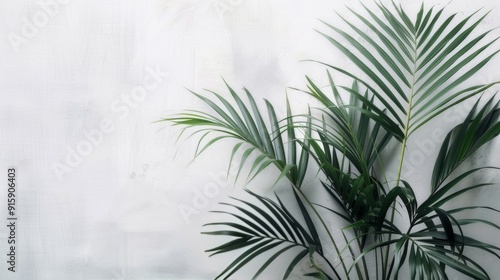 Lush Green Palm Leaves on Light Beige Background