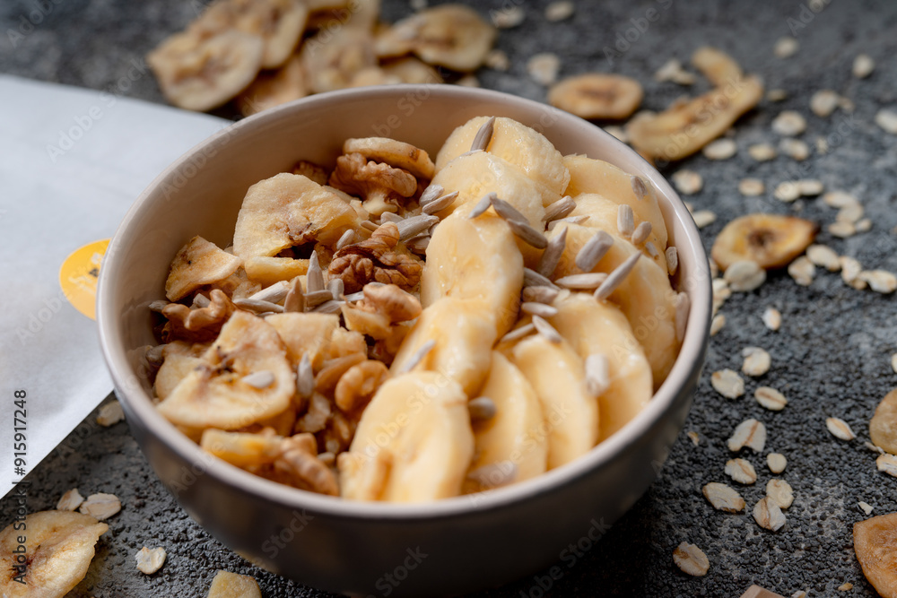 Healthy granola bowl with blueberries and strawberries.Healthy lifestyle.Healthy fruits.Kitchen in background