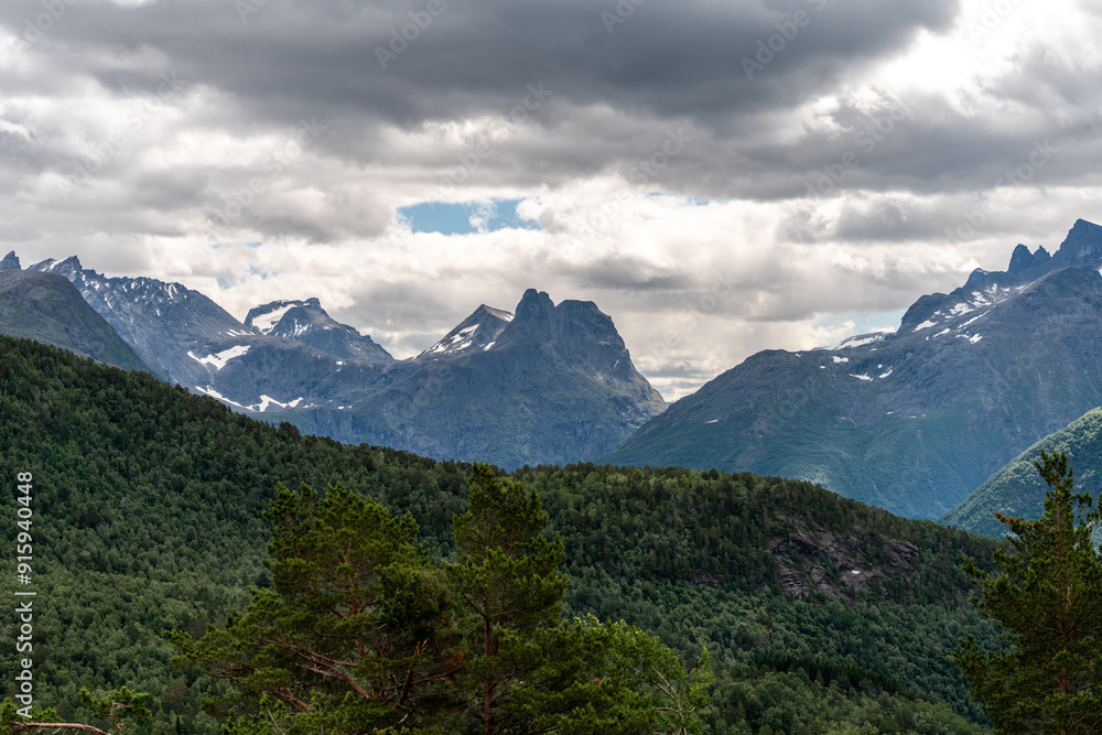 Fototapeta premium drone aerial view over Massvassbu are close to Isfjorden/Andalsnes in the fjord of Norway. Hikingtrail on a summer cold day
