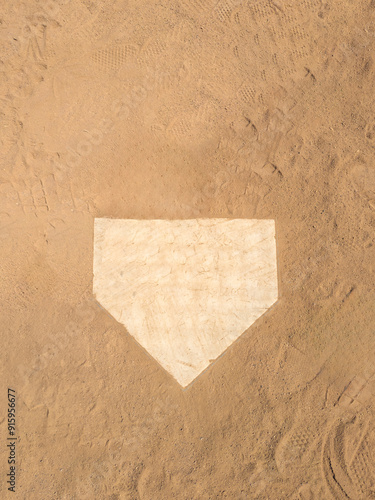 Top down view on home plate on a dirt baseball field
