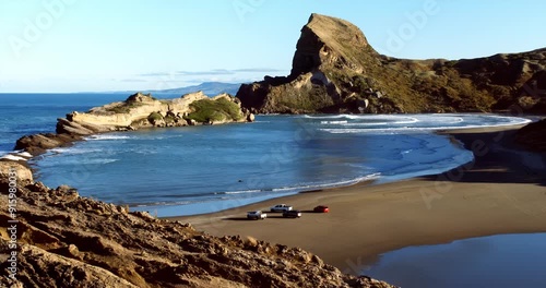 view of castlepoint beach and the castlerock photo