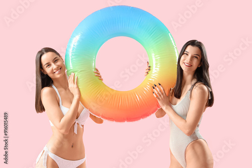 Female friends in beachwear...