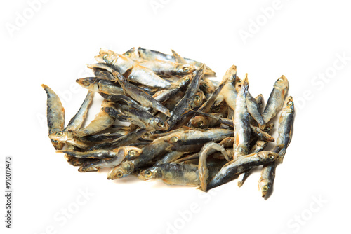 Dried raw fish on isolated white background (ikan asin kering di latar belakang warna putih) photo