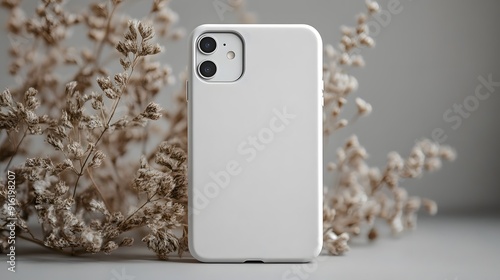 White phone case mockup displayed on a neutral grey background, simple and elegant