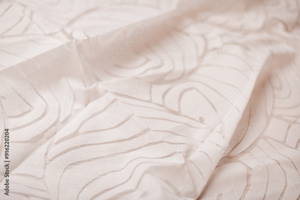 Obraz premium Smooth white fabric with a subtle embossed design. Ideal for showcasing minimalism, elegance, or home décor inspiration.