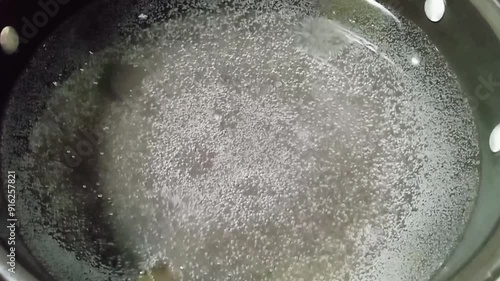 Boiling water in saucepan. Process of cooking food
