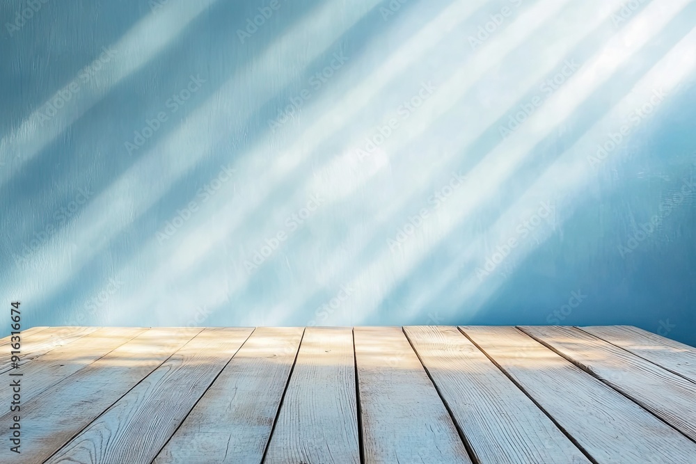 Empty wood table top on a pastel blue wall with sunray patterns background Empty wood table top on a pastel blue wall with sunray patterns background