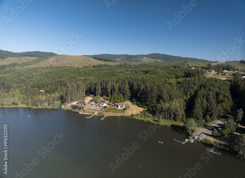 Wallpaper Mural A beautiful lake with a house on the shore Torontodigital.ca