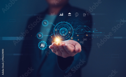 Businessman holding digital interface icons including AI and data analytics. Conceptual technology