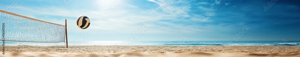 Obraz premium Vibrant Beach Volleyball Under the Azure Sky: The Perfect Backdrop for Sports and Summer Themed Imagery