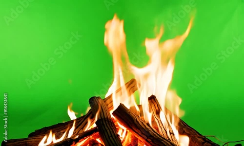 A campfire that flickers pleasantly and gives warmth in the cold. Generative ai. Green screen