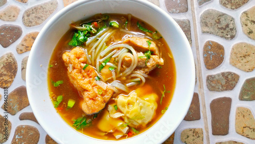 meatballs and noodles with spicy soup