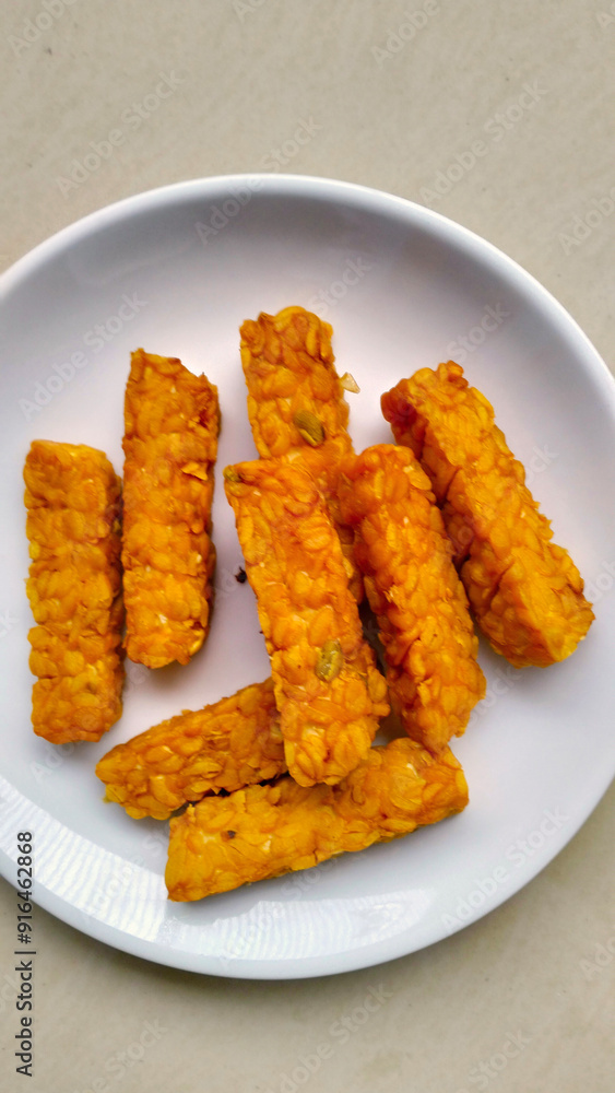 fried tempeh, a cheap source of protein