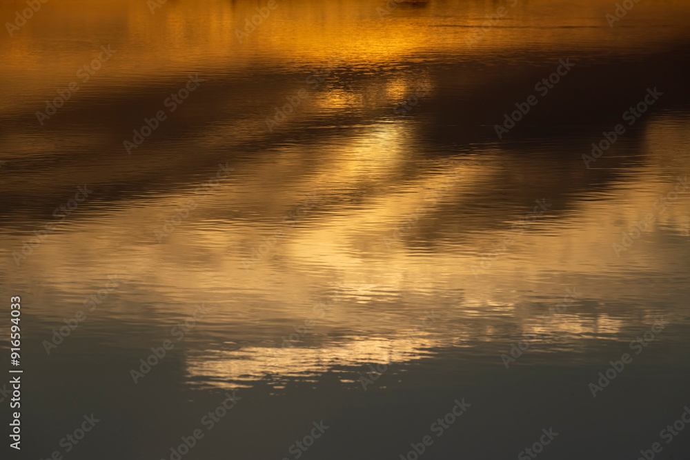reflection of trees at sunset, river with reflection reflection of trees at sunset, river with reflection