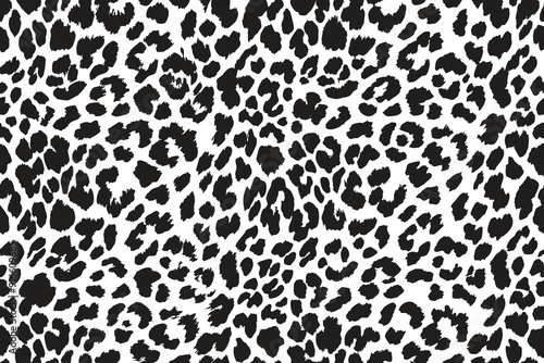 Seamless black and white leopard pattern, ideal for fashion, textile, and decor.