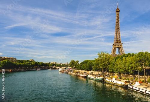 Eiffel Tower at left bank of seine river in paris, france photo