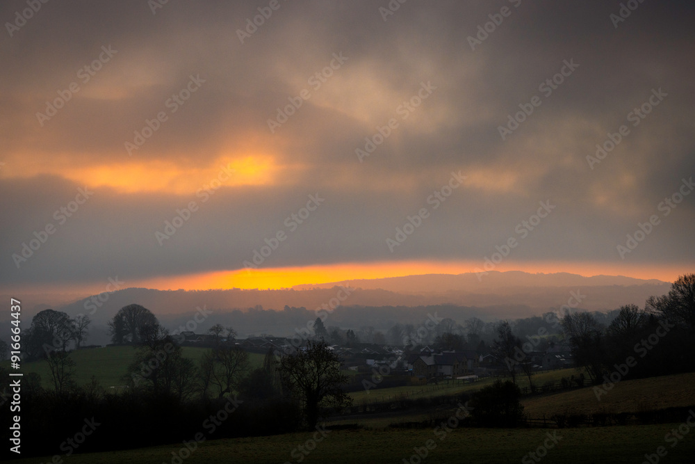 Misty morning sunrise over Gwernaffield, Mold, Wales Misty morning sunrise over Gwernaffield, Mold, Wales