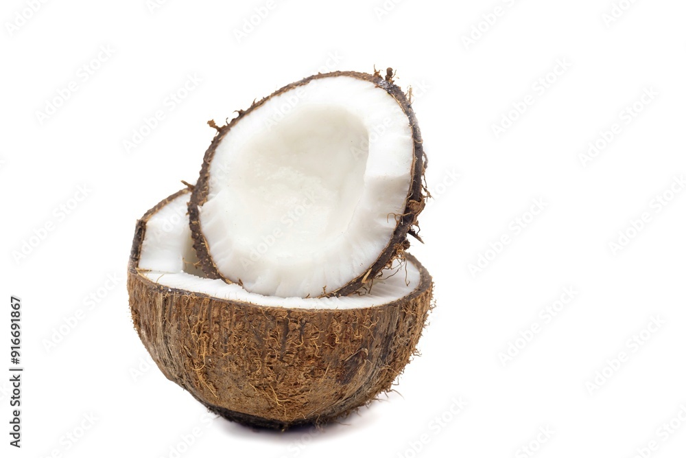 Half Coconut Piece with Coconut Flesh Isolated on White Background with Copy Space Half Coconut Piece with Coconut Flesh Isolated on White Background with Copy Space