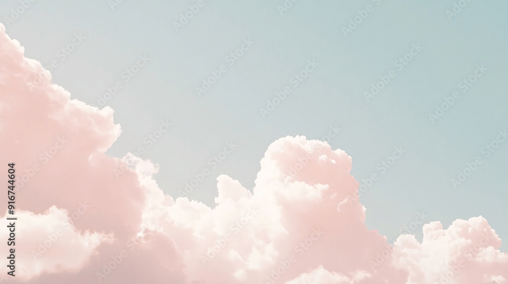 Serene and soft minimalist image featuring white and pink clouds in a light blue sky Serene and soft minimalist image featuring white and pink clouds in a light blue sky