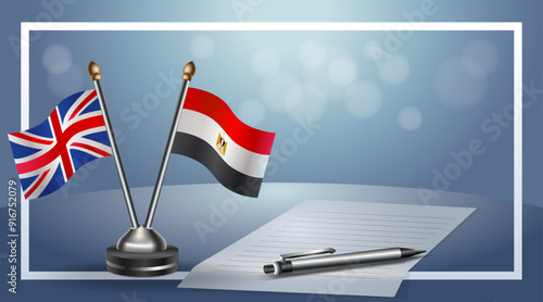 United Kingdom and EGYPT Small national flag on bokeh background, cooperative relationship