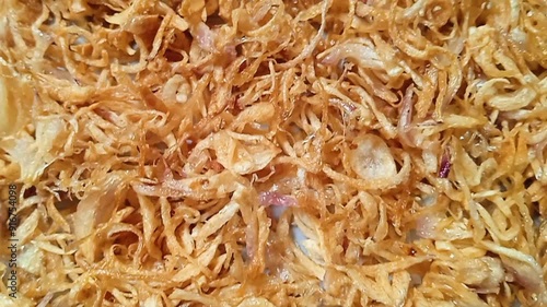 Deep fried shallots. Full frame. Rotation