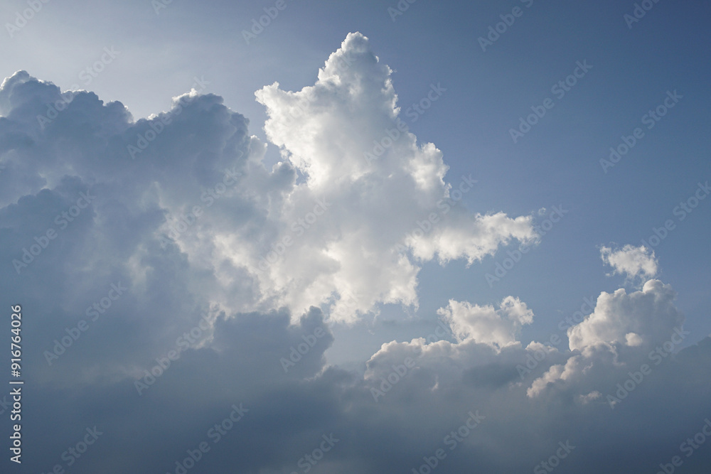 Dramatic Cumulus Clouds Against a Blue Sky Dramatic Cumulus Clouds Against a Blue Sky