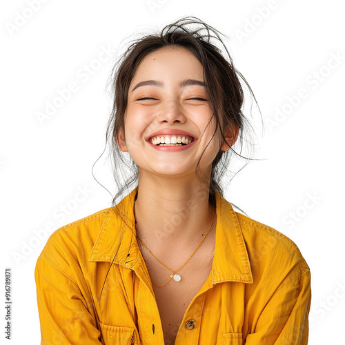 A happy asian woman with a yellow shirt is smiling and wearing a necklace