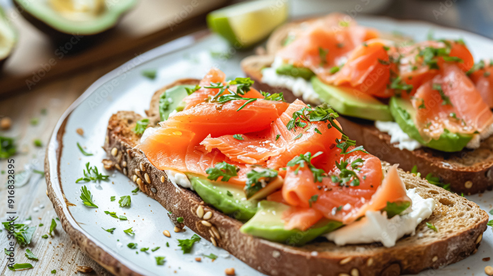 Avocado toast with smoked salmon for breakfast, homemade cuisine and traditional food, country life Avocado toast with smoked salmon for breakfast, homemade cuisine and traditional food, country life