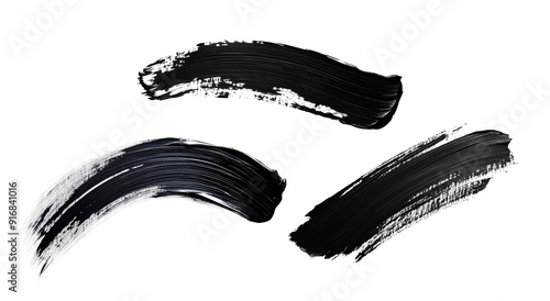 Three black brush strokes on a white background