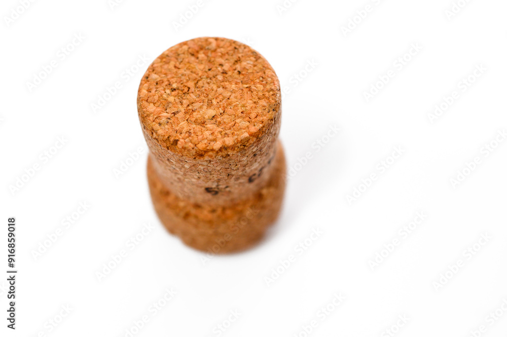 A single champagne cork isolated on a white background A single champagne cork isolated on a white background