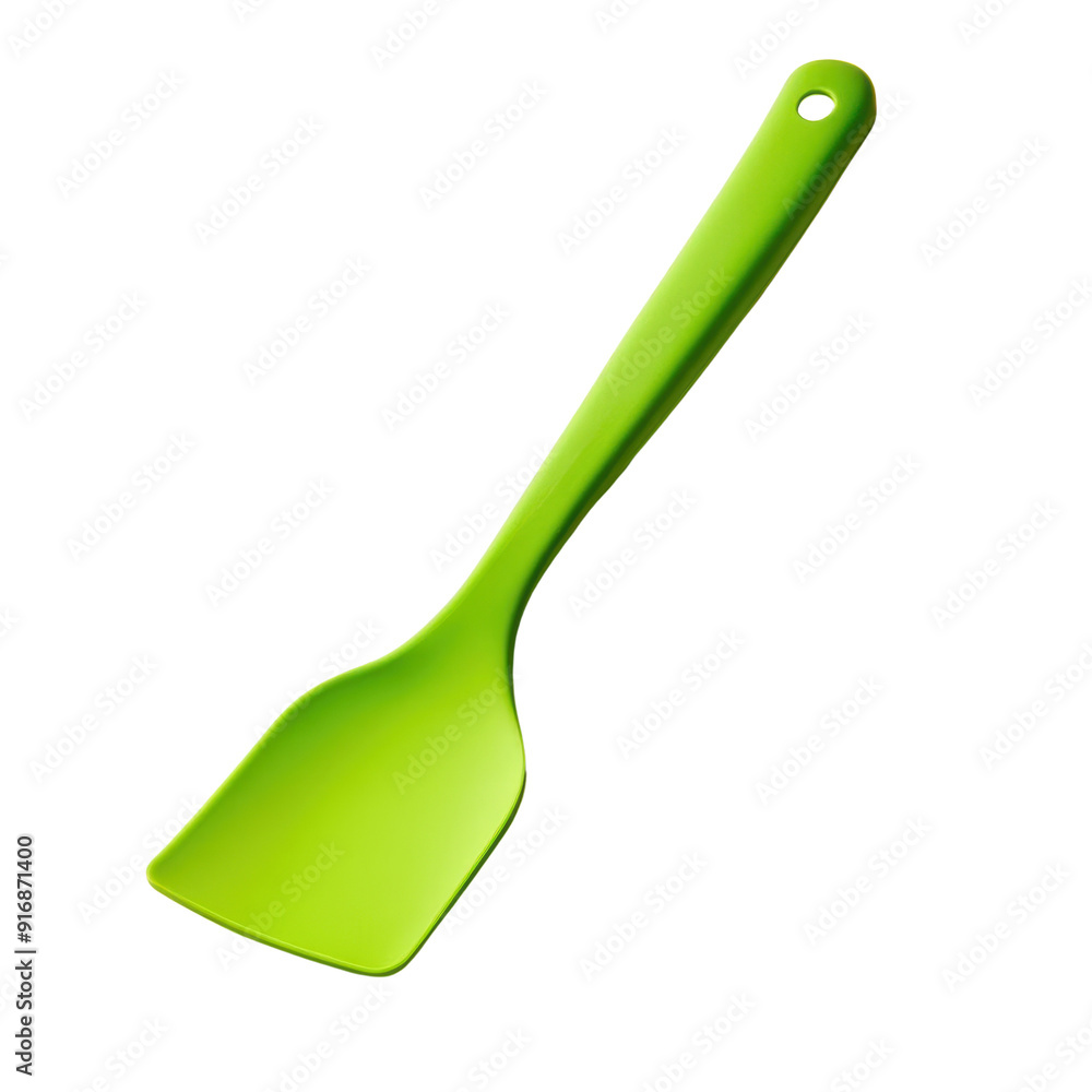 A bright green spatula. A bright green spatula.