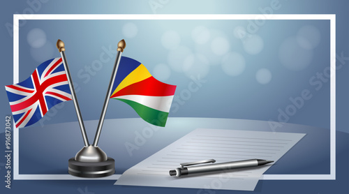 United Kingdom and Seychelles Small national flag on bokeh background, cooperative relationship