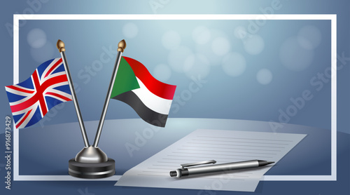 United Kingdom and Sudan Small national flag on bokeh background, cooperative relationship