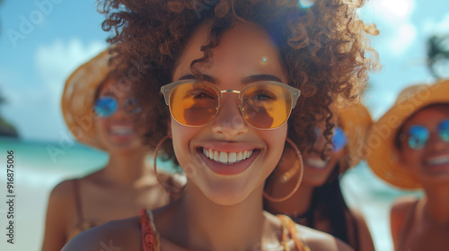 Three beautiful smiling girlfriends taking selfie with mobile phone. Multi ethnic group of women sitting outdoors by the city street and taking self portrait.