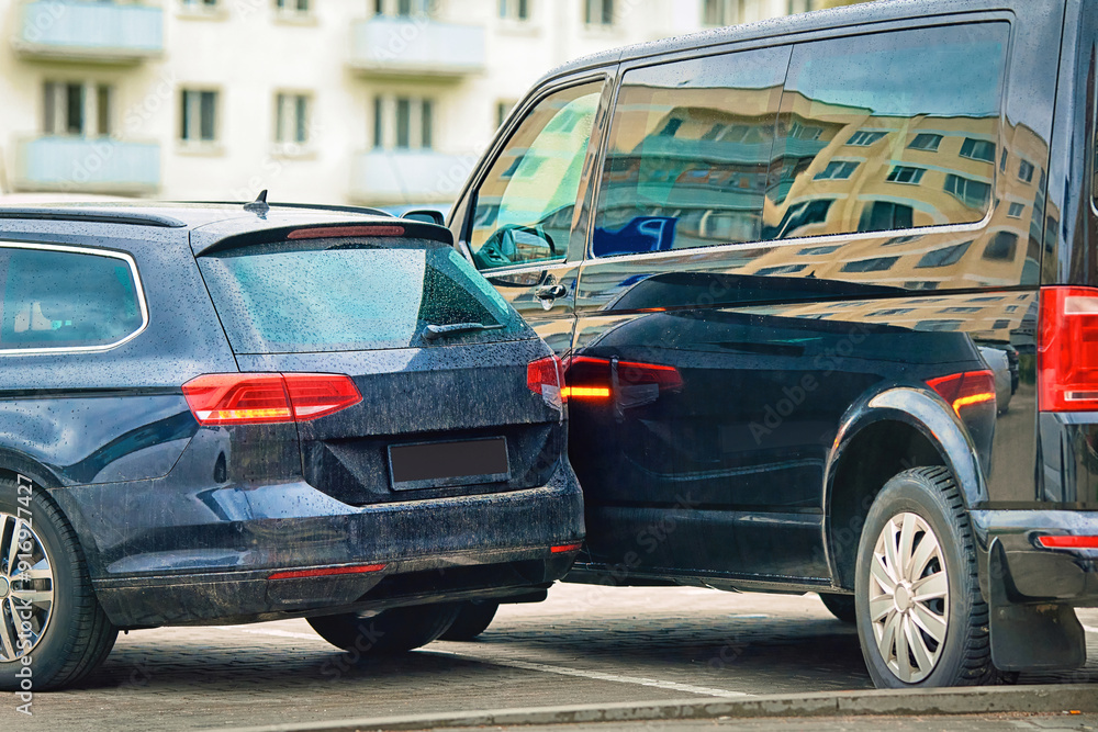 Rear-end collision in parking lot, collision between two cars, damaged ...