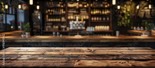 Wooden table in a bar restaurant cafe displaying a mock-up menu frame with ample copy space image.