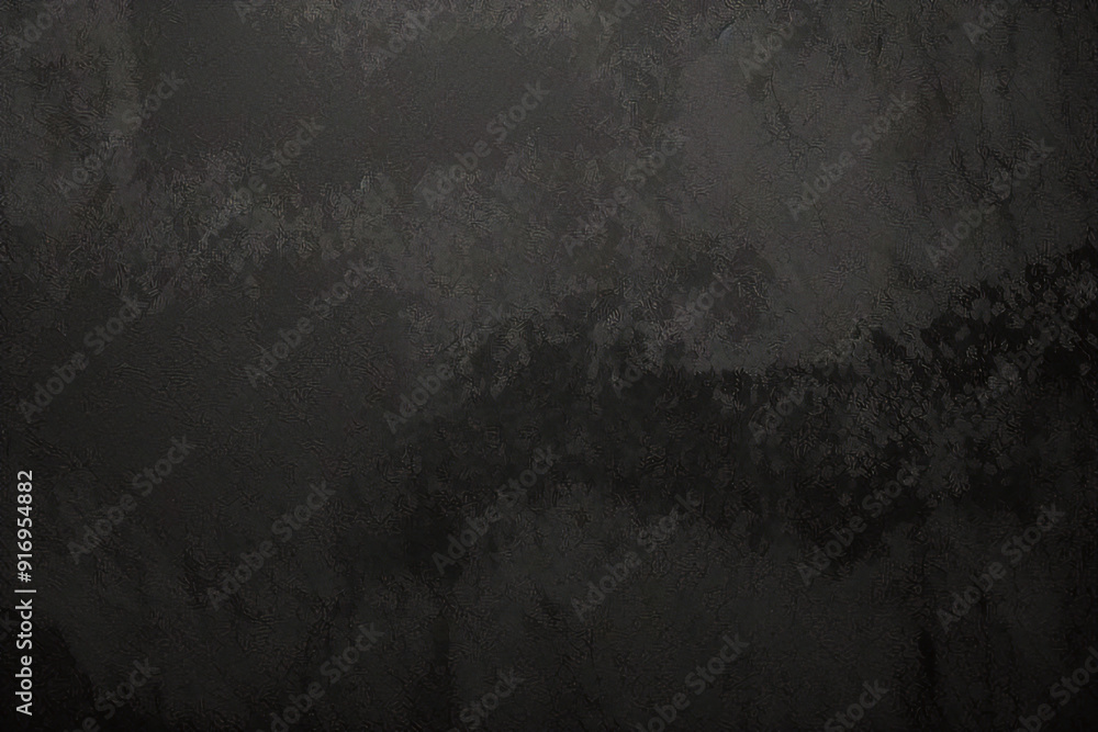 Fototapeta premium Fondo de textura rugosa de pared negra, suelo de hormigón o fondo antiguo grunge, iluminado por rayos de sol. Primer plano de la superficie de grafito oscuro para un diseño de fondo moderno.