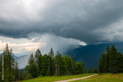 Fényképezés Thunderstorm with heavy downpour over the Italian Alps