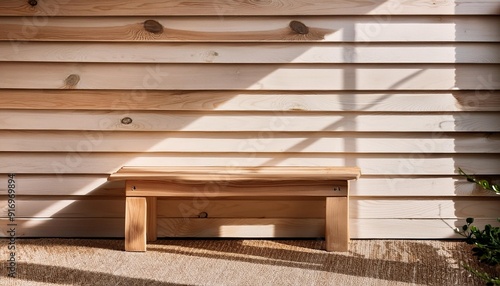 board and batten accent wall with a small decorative bench photo