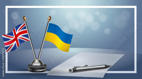 United Kingdom and Ukraine Small national flag on bokeh background, cooperative relationship