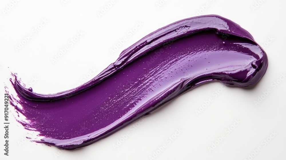 Artistic purple lip gloss smudge on a clean white background, highlighting its rich, glossy finish and bold hue Artistic purple lip gloss smudge on a clean white background, highlighting its rich, glossy finish and bold hue