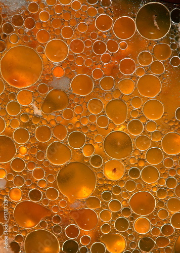 Abstract background with circles in oil.