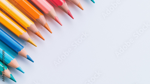 Create an image of bright colored pencils on paper, viewed from above in a close-up shot. The scene should be professionally shot in 4K resolution, showcasing the vivid colors and details of the penci photo