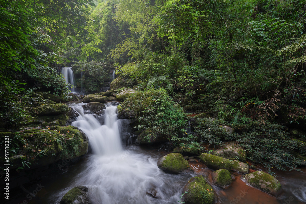 Beautiful and natural waterfall in the tropical rainforest. concept of nature, outdoor, forest, green, travel. Sapan waterfall, Thailand. Beautiful and natural waterfall in the tropical rainforest. concept of nature, outdoor, forest, green, travel. Sapan waterfall, Thailand.