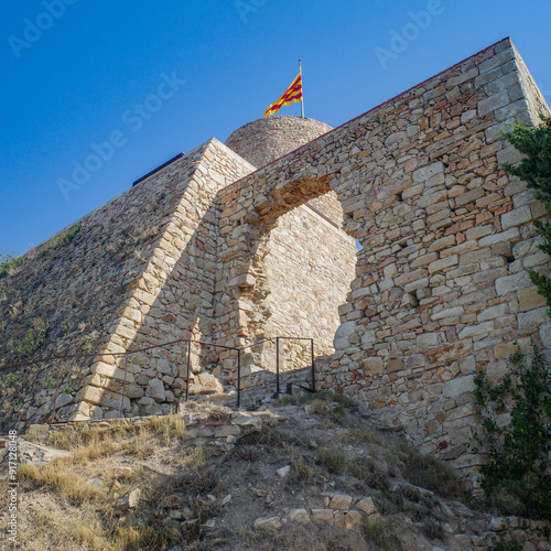 Blanes, Spain - 10 Aug, 2024: Sant Joan castle overlooking the town of Blanes, Costa Brava, Catalonia photo