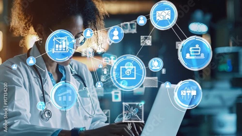 A doctor is typing on a laptop with a screen displaying a complex network of interconnected icons. Concept of a busy and technologically advanced medical environment.