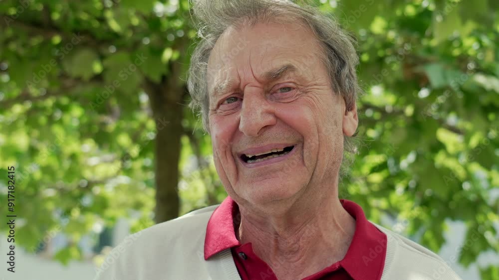 Elderly man outdoors with a broad smile, radiating joy and positivity, showing deep laugh lines and an expressive face. A moment of genuine happiness captured in a natural setting Elderly man outdoors with a broad smile, radiating joy and positivity, showing deep laugh lines and an expressive face. A moment of genuine happiness captured in a natural setting