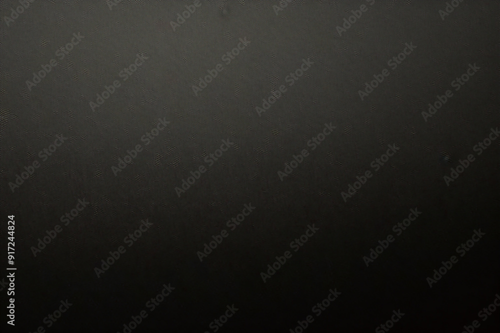 Black foil gradient texture background with uneven surface Black foil gradient texture background with uneven surface