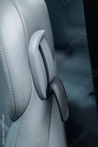 Handle for moving the car seat in a convertible to the second row photo