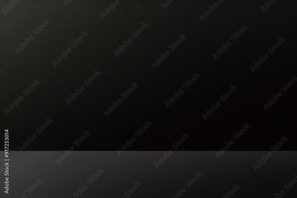 Black foil gradient texture background with uneven surface Black foil gradient texture background with uneven surface